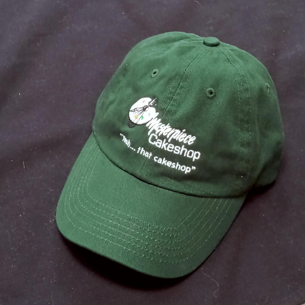 Green Ball Cap – Masterpiece Cakeshop